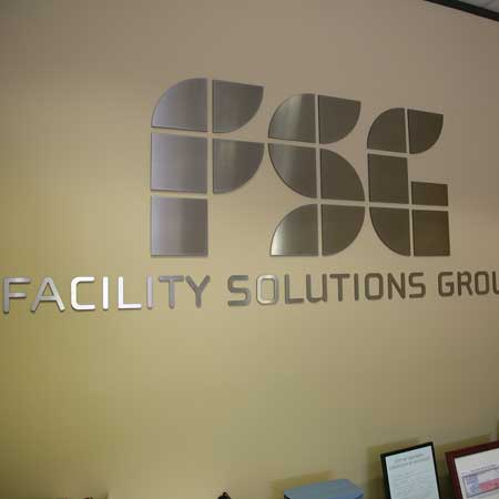 Metal faced acrylic letters in reception area of FSG Group