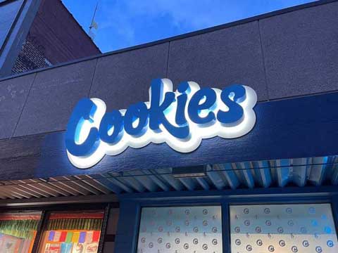 Fabricated stainless steel lighted sign for the Cookie Store